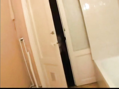 Young Girl plays in Bathroom